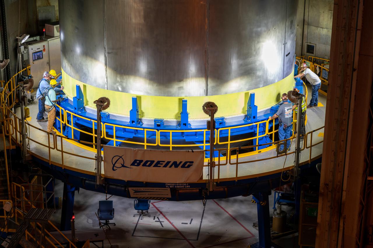 This image highlights the liquid hydrogen tank that will be used on the core stage of NASA’s Space Launch System rocket for Artemis II, the first crewed mission of NASA’s Artemis program. The tank is being built at NASA’s Michoud Assembly Facility in New Orleans. The SLS core stage is made up of five unique elements: the forward skirt, liquid oxygen tank, intertank, liquid hydrogen tank, and the engine section. The liquid hydrogen tank holds 537,000 gallons of liquid hydrogen cooled to minus 423 degrees Fahrenheit and sits between the core stage’s intertank and engine section. The liquid hydrogen hardware, along with the liquid oxygen tank, will provide propellant to the four RS-25 engines at the bottom of the cores stage to produce more than two million pounds of thrust to launch NASA’s Artemis missions to the Moon. Together with its four RS-25 engines, the rocket’s massive 212-foot-tall core stage — the largest stage NASA has ever built — and its twin solid rocket boosters will produce 8.8 million pounds of thrust to send NASA’s Orion spacecraft, astronauts and supplies beyond Earth’s orbit to the Moon and, ultimately, Mars. Offering more payload mass, volume capability and energy to speed missions through space, the SLS rocket, along with NASA’s Gateway in lunar orbit, the human landing system, and Orion spacecraft, is part of NASA’s backbone for deep space exploration and the Artemis lunar program. No other rocket can send astronauts in Orion around the Moon in a single mission.